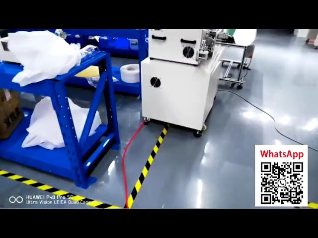 Zautomatyzowany system ściągania izolacji: 70mm² z automatycznym zwijaniem i 50mm² z ramieniem robota + przenośnik